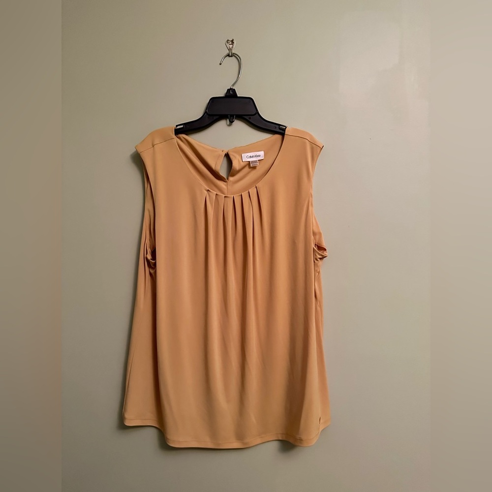 EUC Calvin Klein sleeveless top. Color is like marigold.